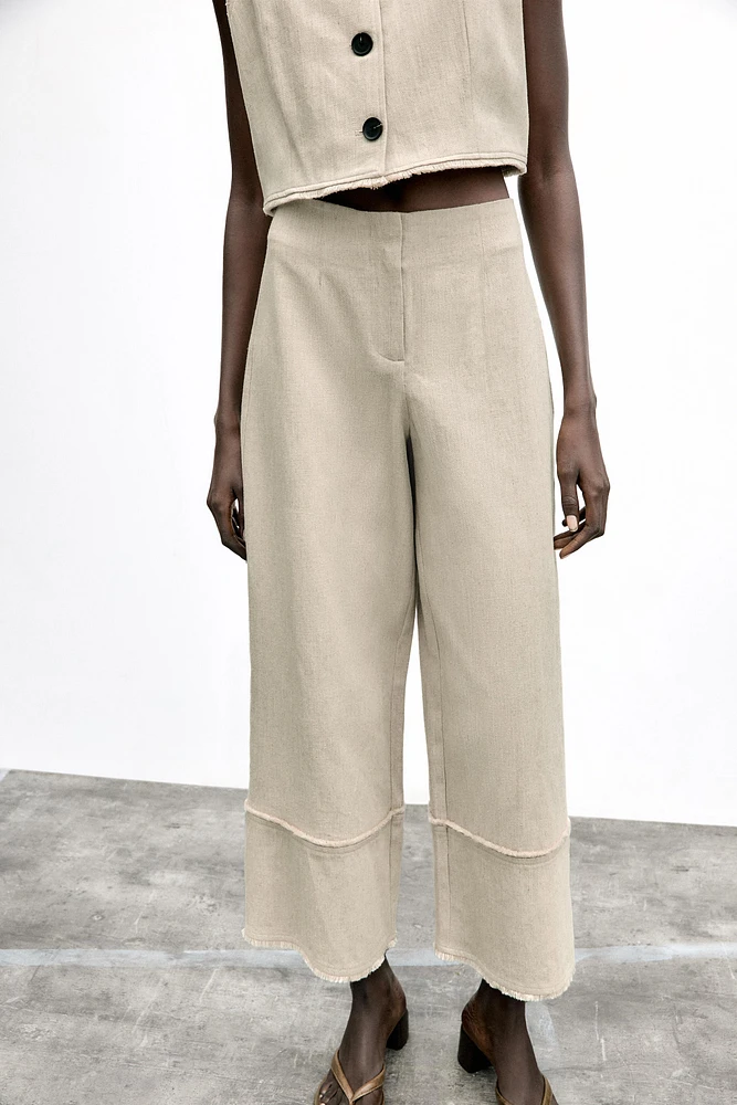 PANTALON RUSTIQUE EFFRANGÉ
