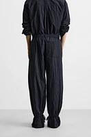 PANTALON EN COTON À EFFET PLISSÉ