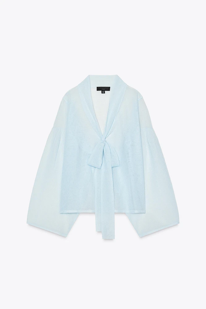 BLOUSE SEMI-TRANSPARENTE EN MAILLE