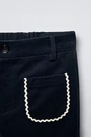 POCKETED FLARE PANTS