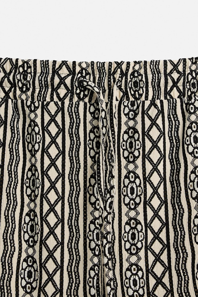 PERFORATED JACQUARD RELAXED FIT PANTS
