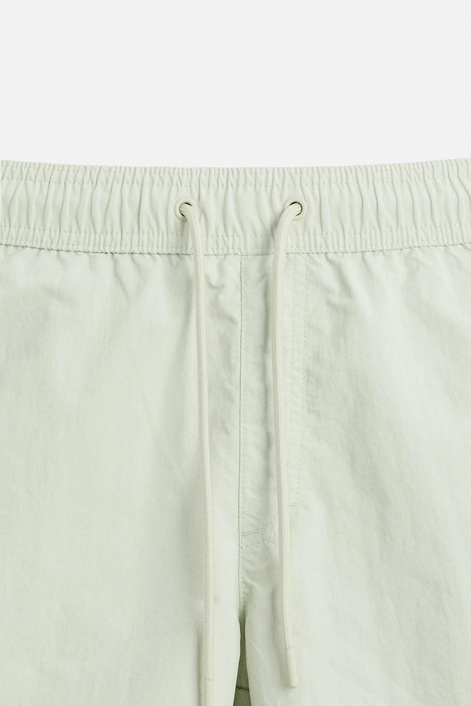 CONTRAST BANDS MID-LENGTH SWIMSUIT