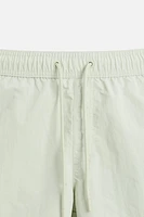 CONTRAST BANDS MID-LENGTH SWIMSUIT