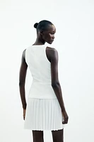 ROBE COURTE EN MATIÈRES VARIÉES