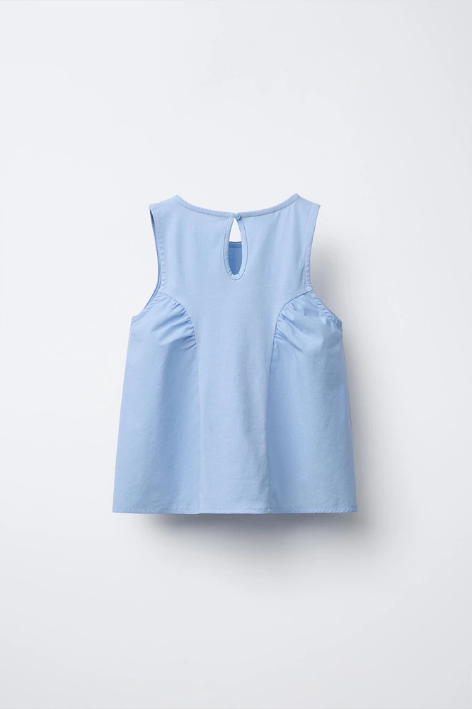 T-SHIRT EN MATIÈRES VARIÉES À FLEURS