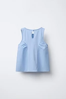 T-SHIRT EN MATIÈRES VARIÉES À FLEURS