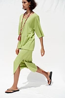 TOP OVERSIZE EN MAILLE MANCHES COURTES