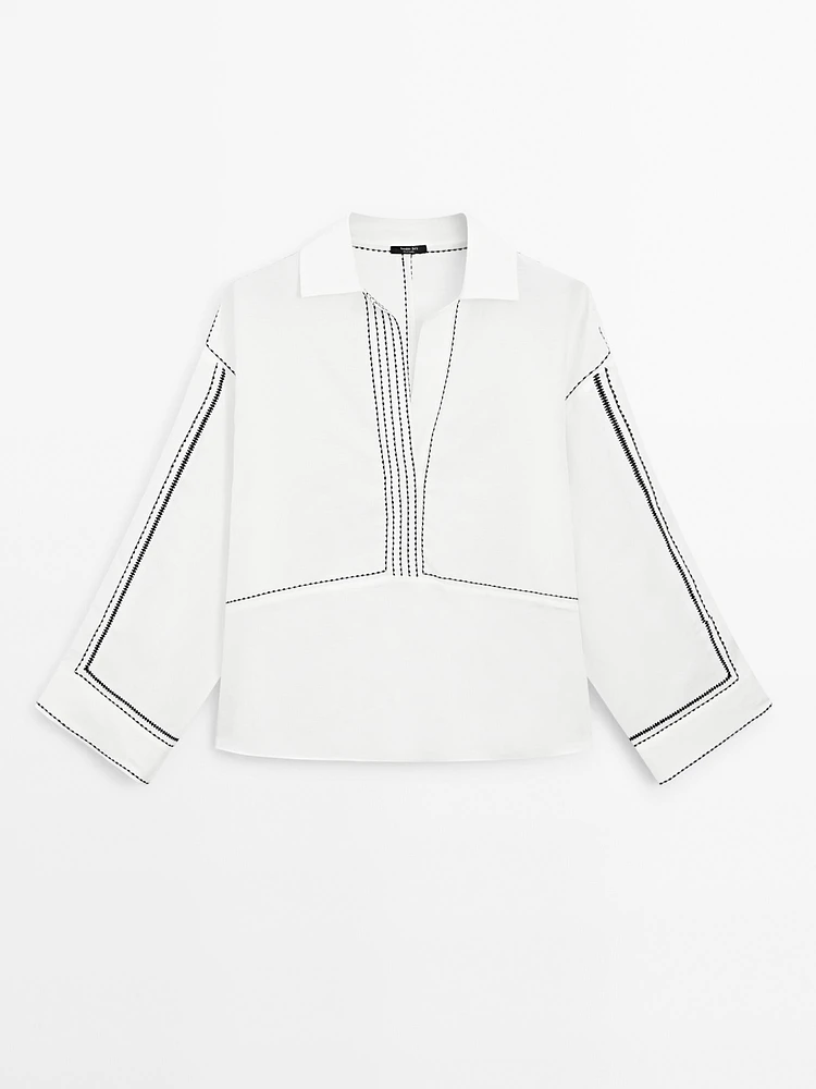 Loose-fitting blouse with contrast details