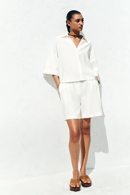 CHEMISE MANCHES COURTES LARGES