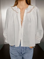 Flowing blouse with lace detail
