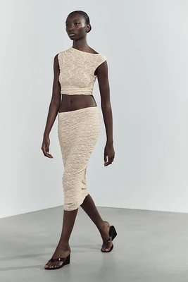 TOP DRAPÉ EN DENTELLE AVEC STRASS