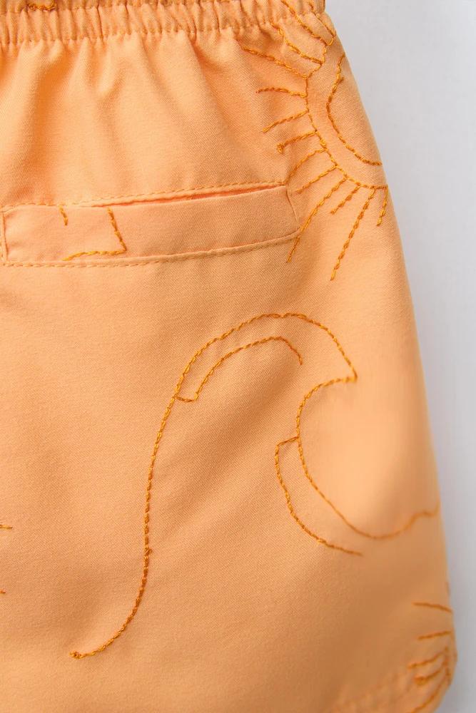 2-6 YEARS/REGULAR SWIM SHORTS WITH EMBROIDERED SUNS