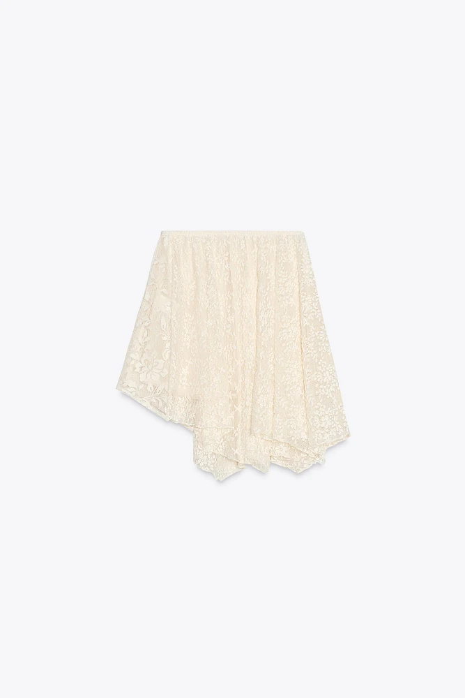 MINI-JUPE ASYMÉTRIQUE EN DENTELLE