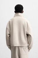 QUARTER ZIP TECHNICAL SWEATSHIRT