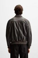 BLOUSON EN CUIR À POCHES