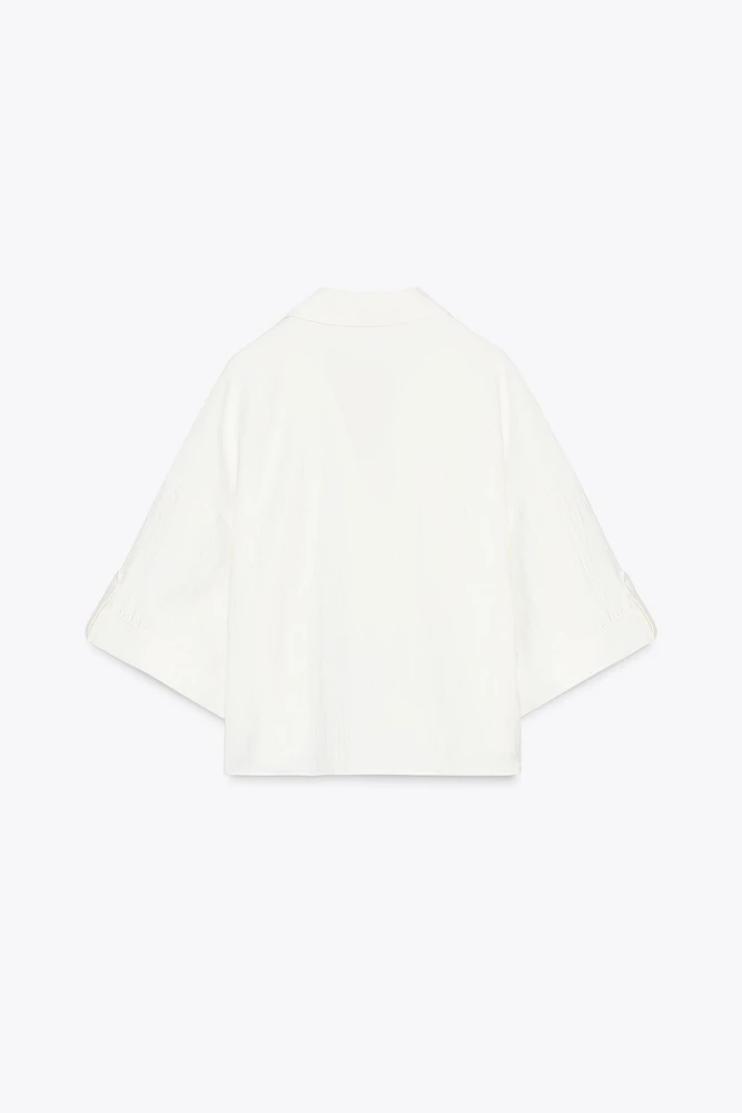 CHEMISE MANCHES COURTES LARGES