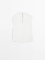 Blouse fluide à col drapé