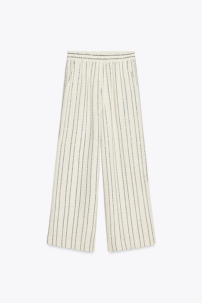 PANTALON RAYÉ À SEQUINS