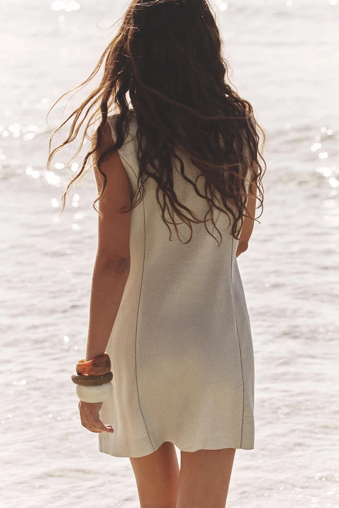 ROBE COURTE EN LIN AVEC SURPIQÛRES