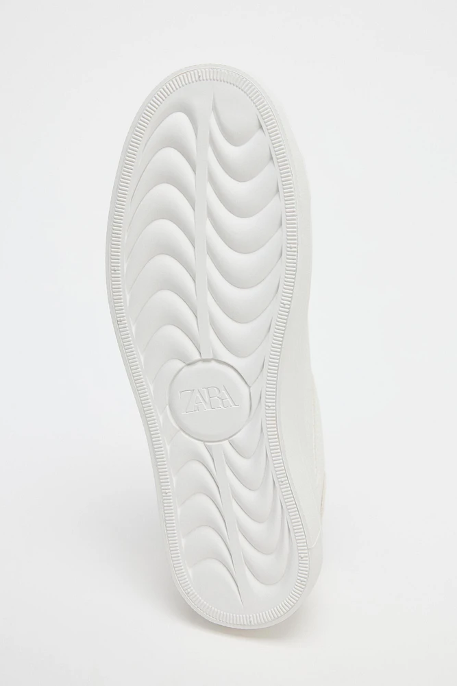 EMBOSSED SNEAKERS