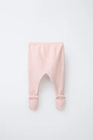 BOW KNIT FOOTED LEGGINGS