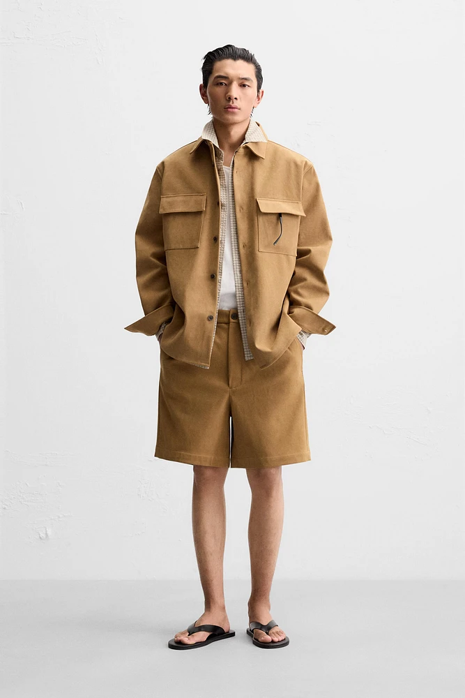 PLEATED FAUX SUEDE SHORTS