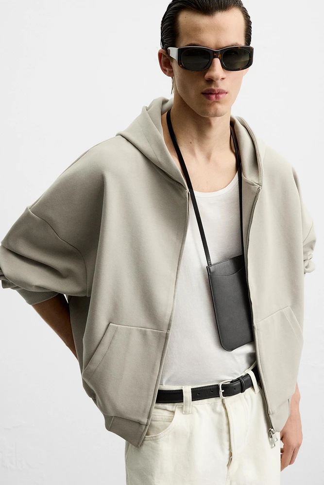 SWEAT BOX FIT CAPUCHE TECHNIQUE