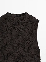 Creased-effect funnel neck top
