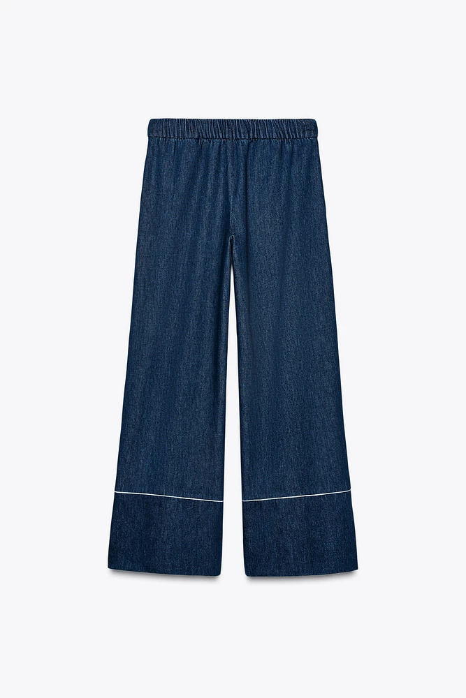 PANTALON LARGE AVEC LISERÉS CONTRASTANTS