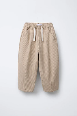 PANTALON À PINCES CARREAUX