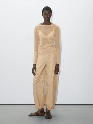 Lightweight trousers with strap details - Studio