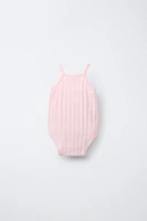 THREE-PACK OF RIB KNIT BODYSUITS WITH CUTOUT DETAIL