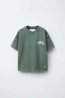 T-SHIRT EFFET DÉLAVÉ GRAFFITI