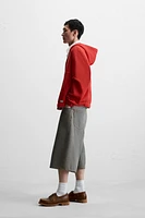 VESTE STRUCTURE OUVERTE CAPUCHE