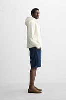 SWEAT BASIQUE À CAPUCHE ET ZIP