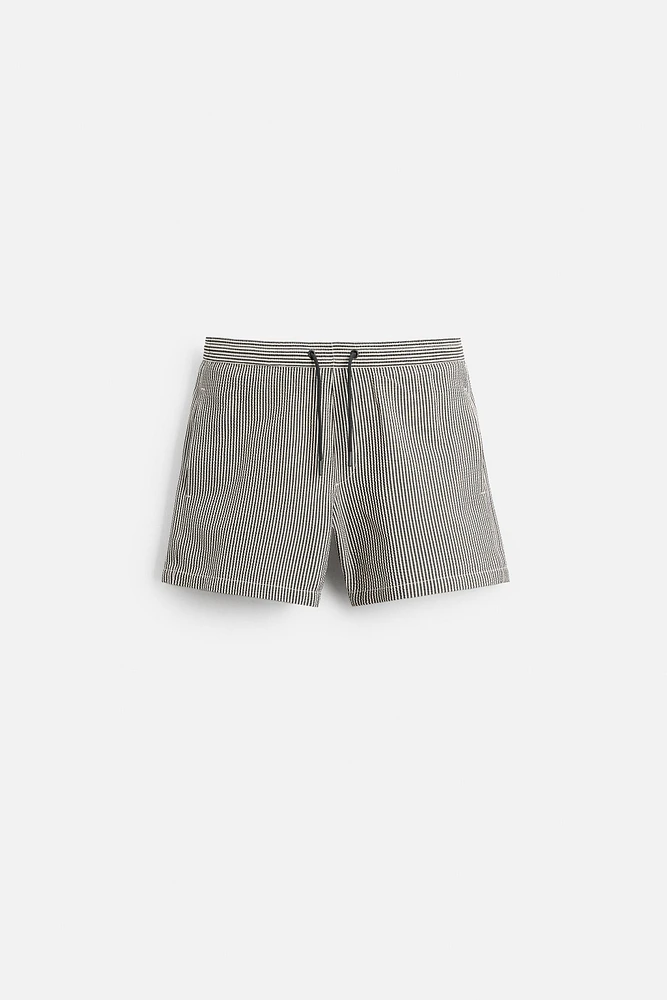 STRIPED SEERSUCKER REGULAR SWIM SHORTS