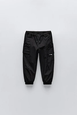 TECHNICAL FABRIC LINED PANTS WITH LABEL