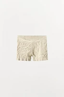 SHORT EN CUIR 100 % À EFFET PLISSÉ