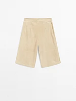 Bermuda long en cuir finition daim