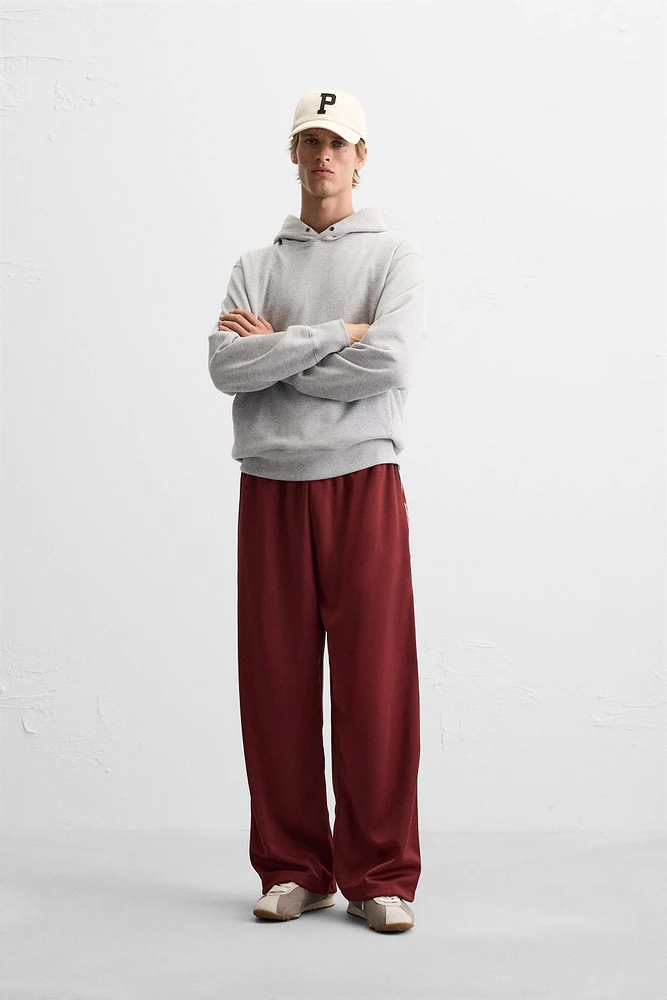 TECHNICAL PANTS WITH BANDS