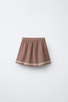 JUPE-SHORT TEXTURÉE À LACETS