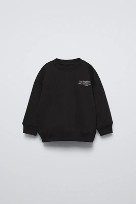 EMBROIDERED TEXT SWEATSHIRT