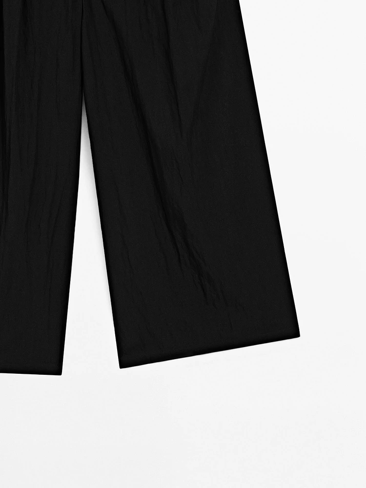Pantalon palazzo fluide à pinces