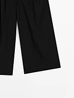 Pantalon palazzo fluide à pinces