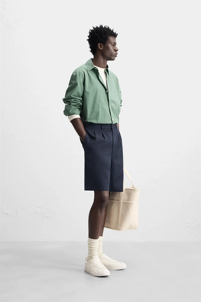 BERMUDA RELAXED FIT À PLIS