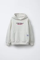 TEXT PRINT HOODED SWEATSHIRT