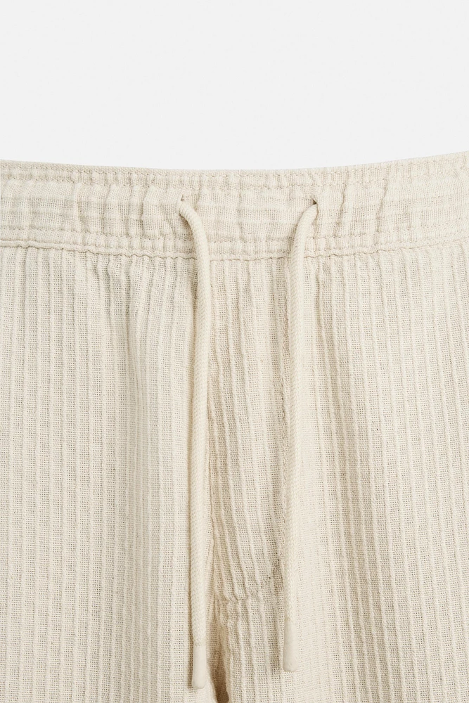 PANTALON EN JACQUARD À RAYURES
