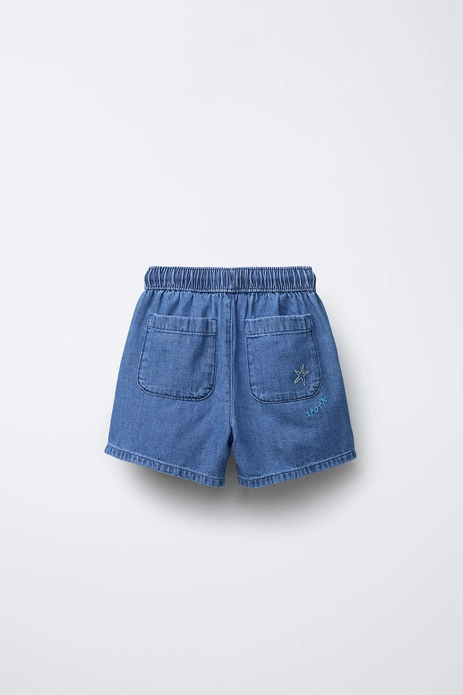 EMBROIDERED PALM TREE DENIM SHORTS