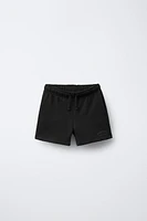 PLUSH SHORTS WITH TEXT