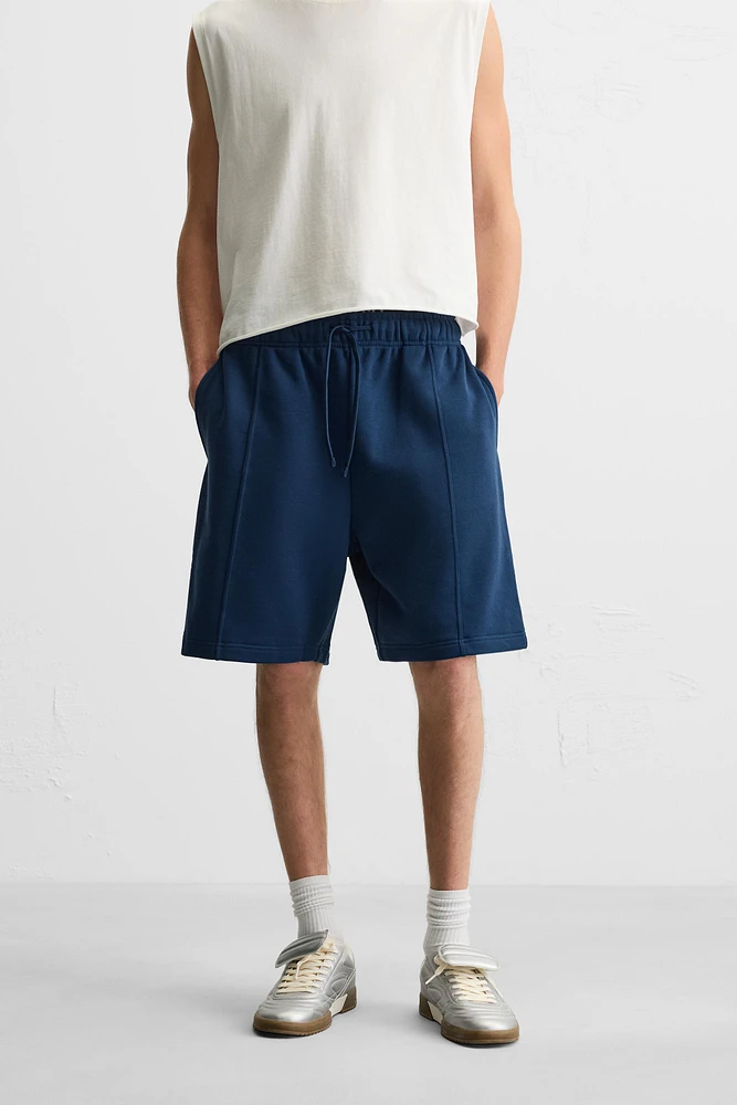 BERMUDA DE JOGGING COUTURES